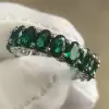 10ctw Oval Cut Emerald and Sapphire Eternity Ring