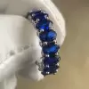 10ctw Oval Cut Emerald and Sapphire Eternity Ring