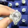 Handmade Pear Cut Halo With Columns Ring in Sterling Silver