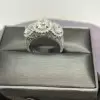 2.85ct Three-Stone Round Cut White Sapphire Halo Engagement Ring
