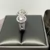 2.85ct Three-Stone Round Cut White Sapphire Halo Engagement Ring