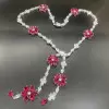 42ctw White Sapphire and Ruby Flower Statement Necklace