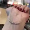 Tapered Baguette Cut White Sapphire Smile Necklace