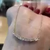 Tapered Baguette Cut White Sapphire Smile Necklace