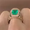 6ct Emerald Cut Emerald Halo Paved Cocktail Ring