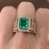 6ct Emerald Cut Emerald Halo Paved Cocktail Ring