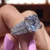Round Cut Three-Row Engagement Ring