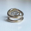 5.8ct Oval Cut White Sapphire Interlocking Loops Engagement Ring