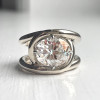 5.8ct Oval Cut White Sapphire Interlocking Loops Engagement Ring