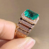 6ct Emerald Cut Emerald Halo Paved Cocktail Ring