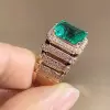 6ct Emerald Cut Emerald Halo Paved Cocktail Ring