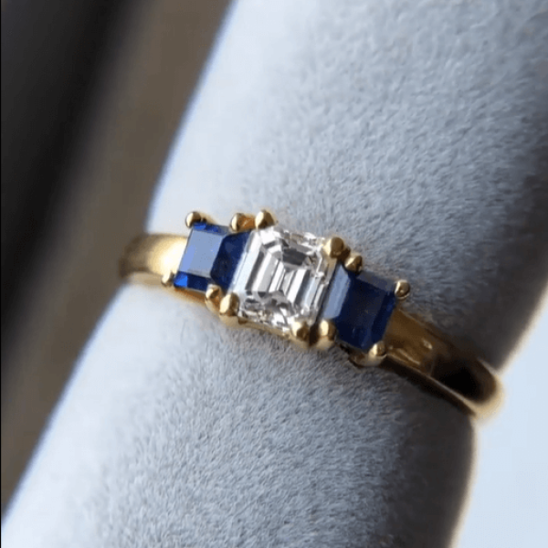 3ctw Emerald Cut Three Stone White & Blue Sapphire Engagement Ring in Gold