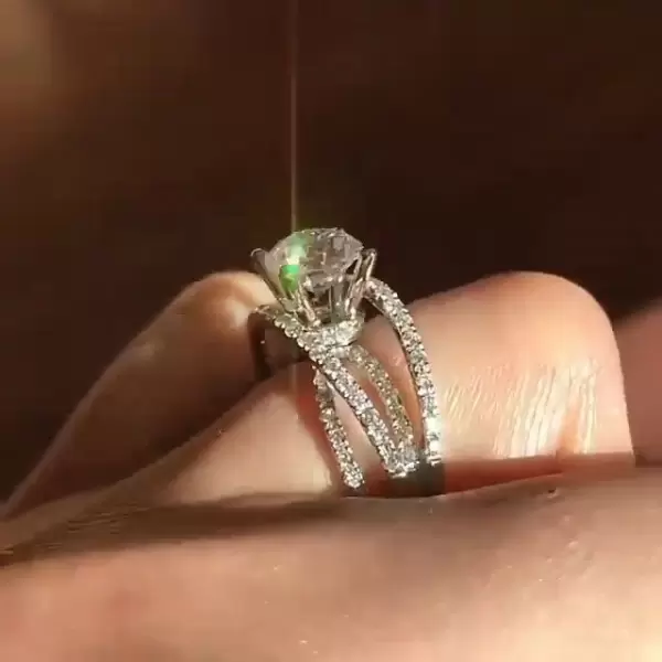 Round Cut Criss Cross Engagement Ring
