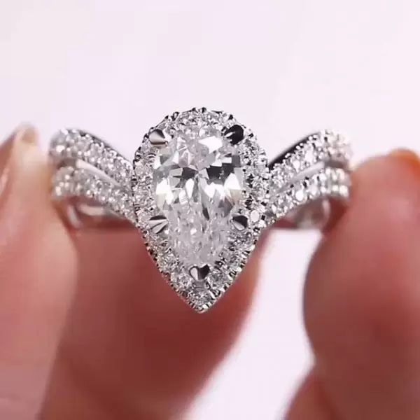 Halo Pear Cut White Sapphire Twist Engagement Ring