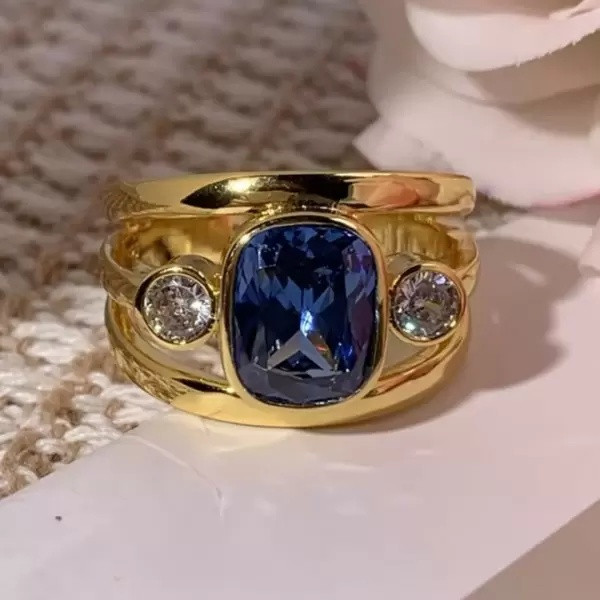 3ctw Cushion Cut Sapphire Three-Stone Ring