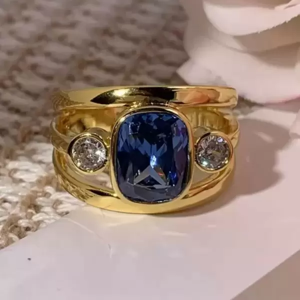 3ctw Cushion Cut Sapphire Three-Stone Ring