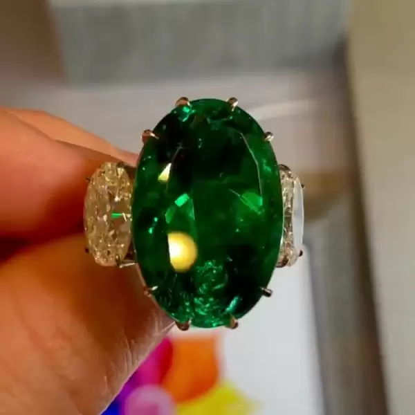 5.8ct Oval Cut Emerald Three-Stone Engagement Ring