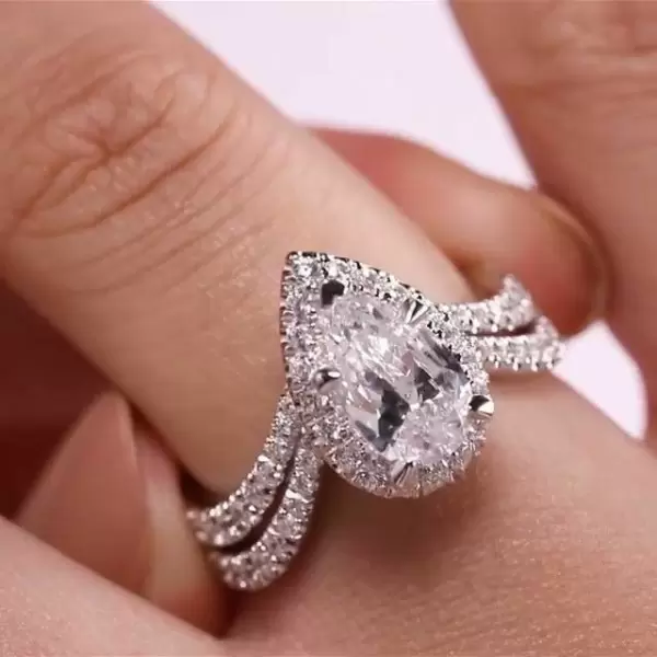 Halo Pear Cut White Sapphire Twist Engagement Ring
