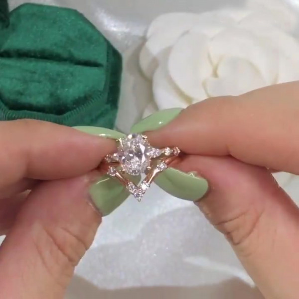 Unique Rose Gold Tone Oval Cut White Sapphire Ring with Curved Eternity Band