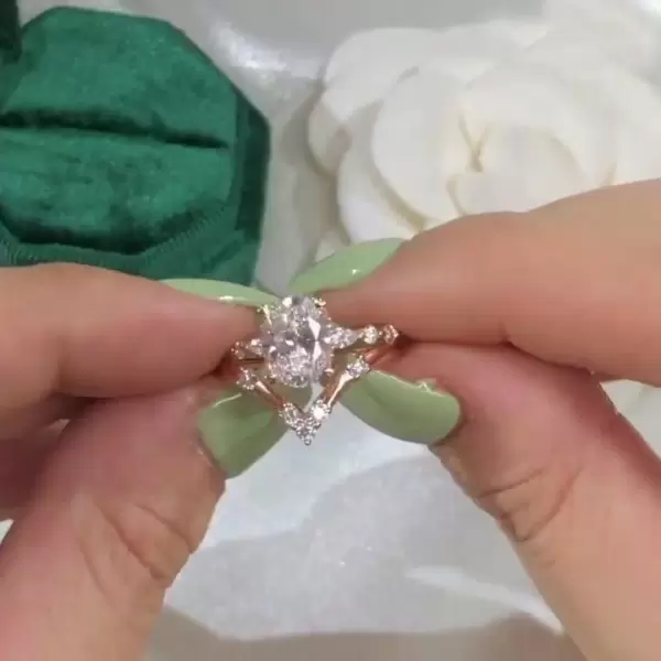 Unique Rose Gold Tone Oval Cut White Sapphire Ring with Curved Eternity Band