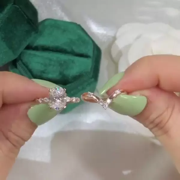 Unique Rose Gold Tone Oval Cut White Sapphire Ring with Curved Eternity Band