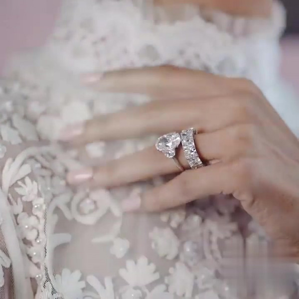 Three-stone Oval Cut Ring With A Radiant Cut Eternity Ring Band
