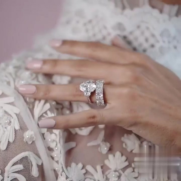 Three-stone Oval Cut Ring With A Radiant Cut Eternity Ring Band