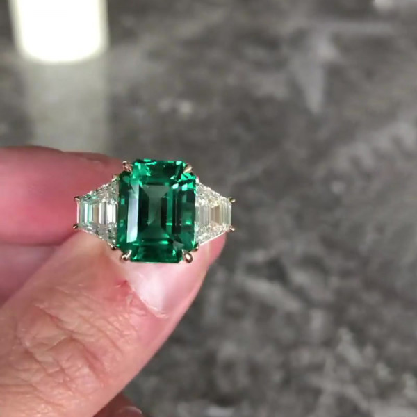 Three-stone Emerald Engagement Ring