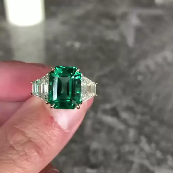 Three-stone Emerald Engagement Ring
