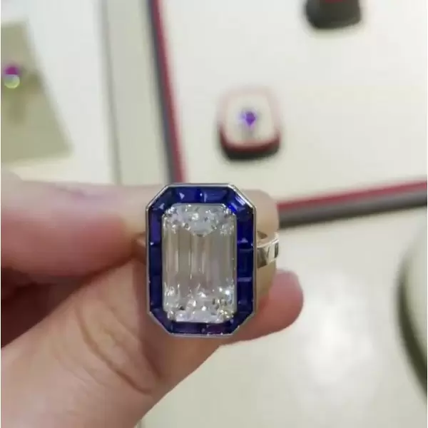 Sapphire Calibre Halo Emerald Cut Engagement Ring