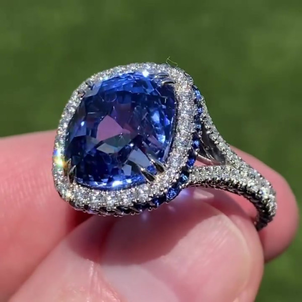 Cushion cut sapphire new arrivals halo ring