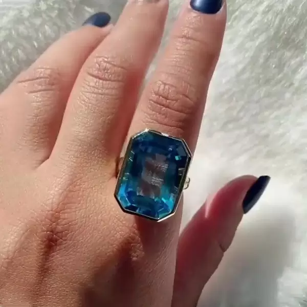 8.5ct Emerald Cut Blue Topaz Split Shank Engagement Ring