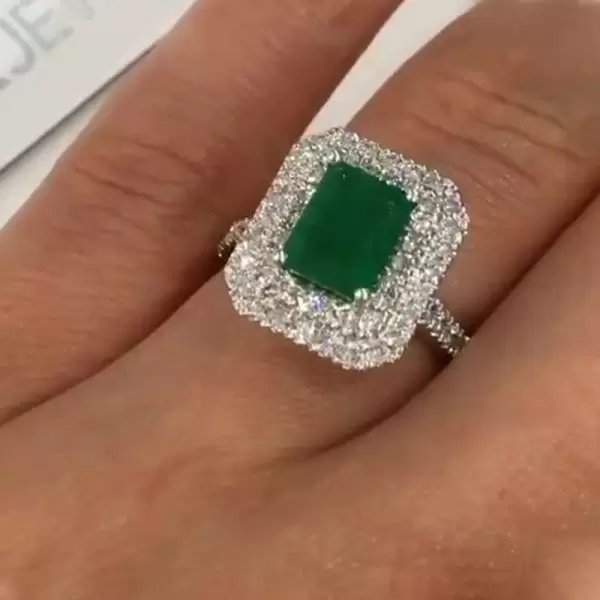 Double halo hotsell emerald engagement ring