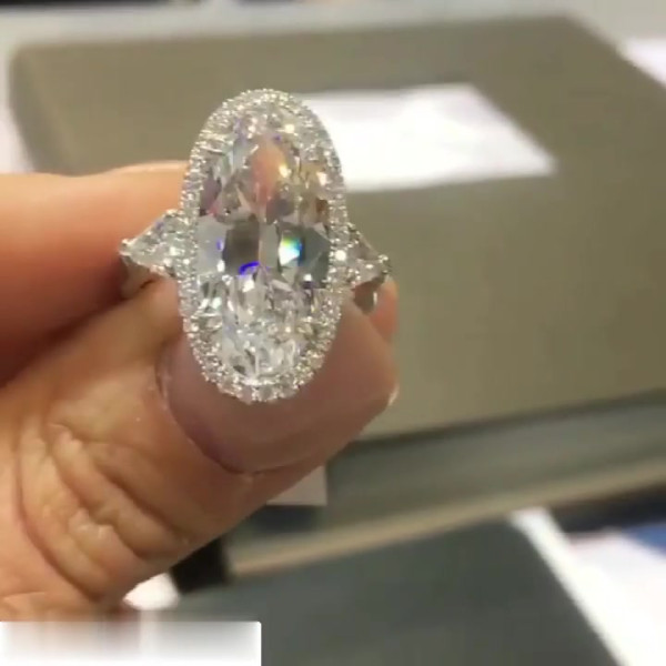 8ct Oval Cut Three-stone Halo Engagement Ring