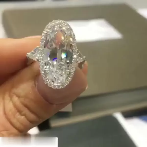8ct Oval Cut Three-stone Halo Engagement Ring