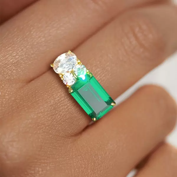 5.5ct Emerald Cut Emerald Asymmetric Engagement Ring
