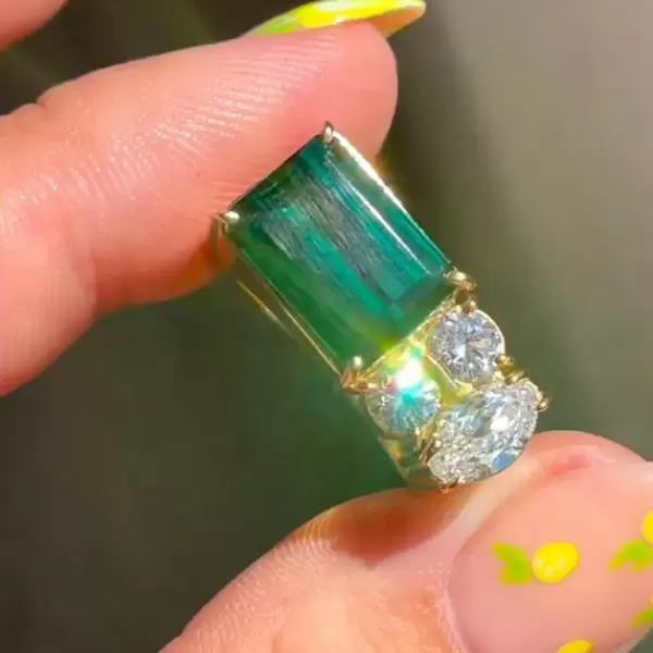 5.5ct Emerald Cut Emerald Asymmetric Engagement Ring