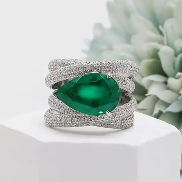 5.7ct East-West Pear Cut Emerald Paved Cocktail Ring