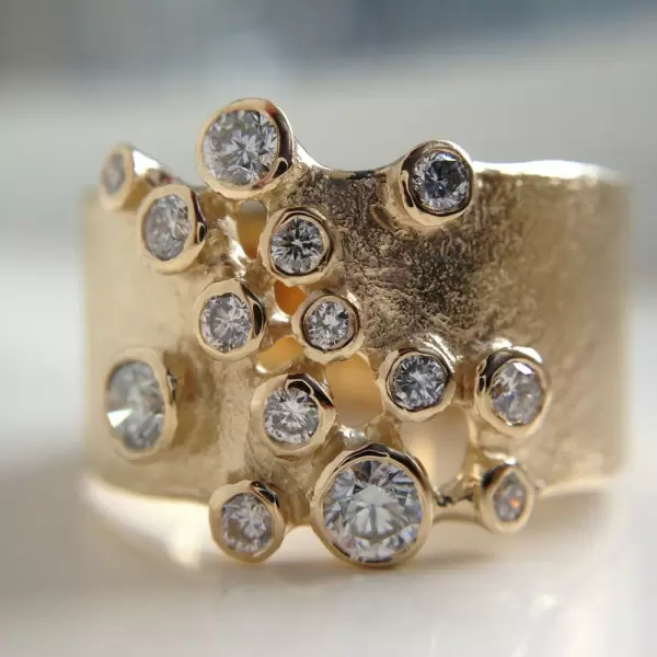 Round Cut White Sapphire Scattered Asymmetric Cigar Band