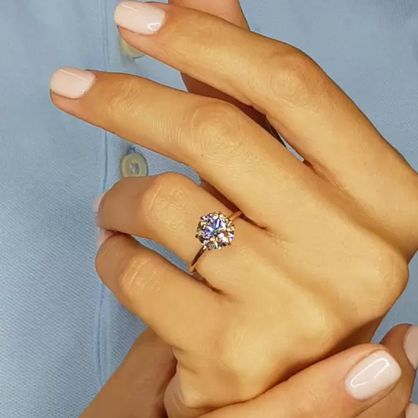 Simple Round Cut White Sapphire Solitaire Ring