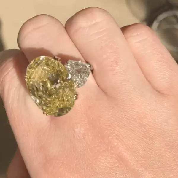 Oval Cut Fancy Intense Yellow Sapphire Three Stone Ring