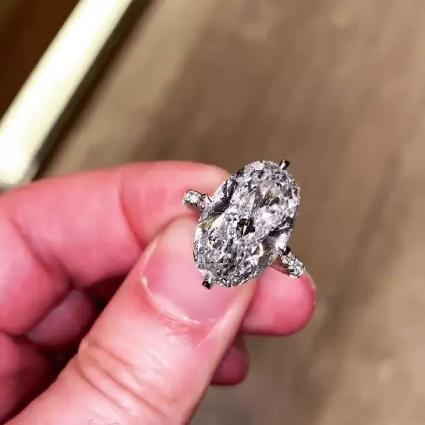 Oval Cut White Sapphire Engagement Ring