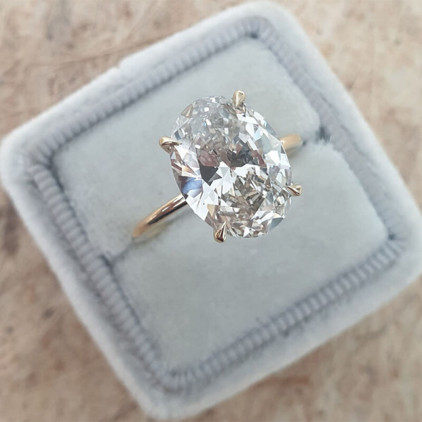 3ct Oval Cut White Sapphire Engagement Ring in Gold