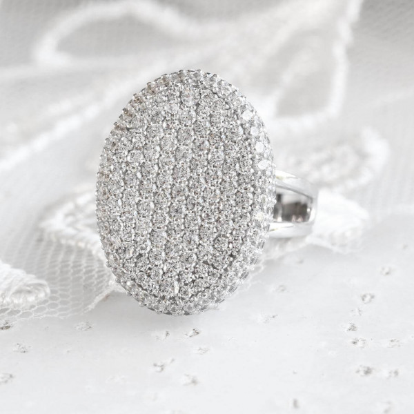 Round Cut Twilight Oval-shaped Paved Cocktail Ring