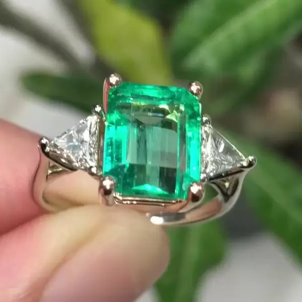 Classic Three-Stone Emerald Cut Engagement Ring