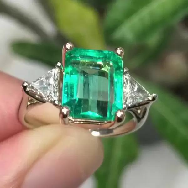 Classic Three-Stone Emerald Cut Engagement Ring