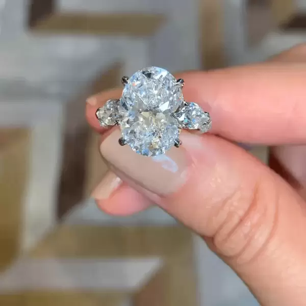 Oval Cut 5 Carat Flanked With Pears On The Sides Engagement Ring
