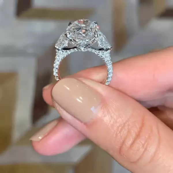 Oval Cut 5 Carat Flanked With Pears On The Sides Engagement Ring