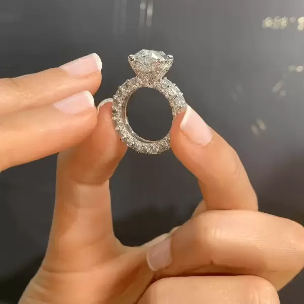 Pear Cut 3 Carat Encrusted Engagement Ring Following By Emerald Cut Eternity Band