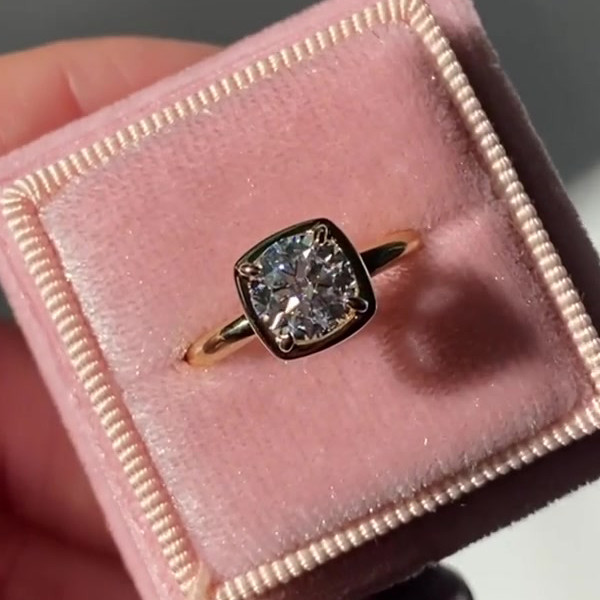 Cushion cut outlet bezel setting